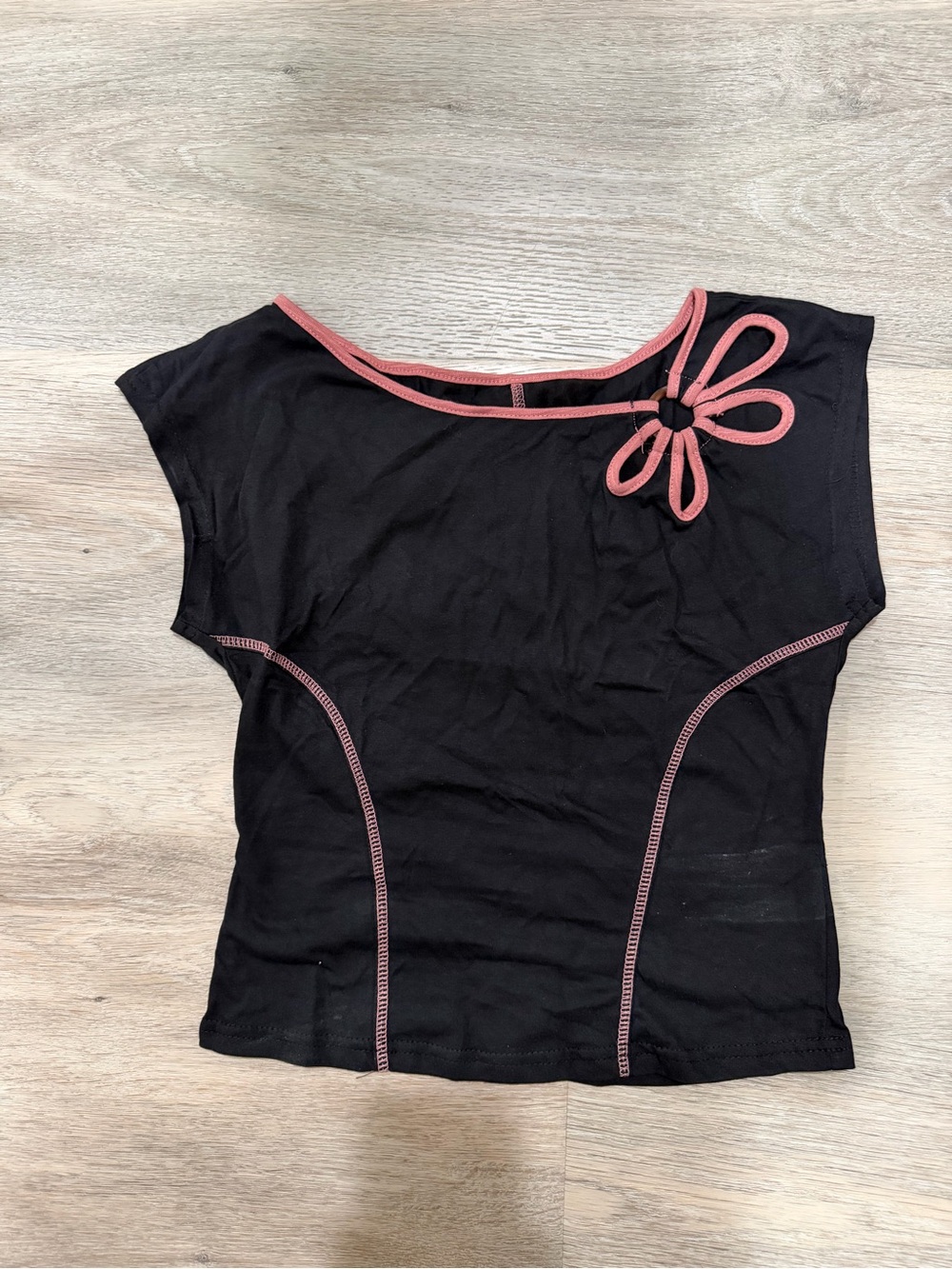 Black Women's Scoop Neck Top with Pink Trim and Flower Detail